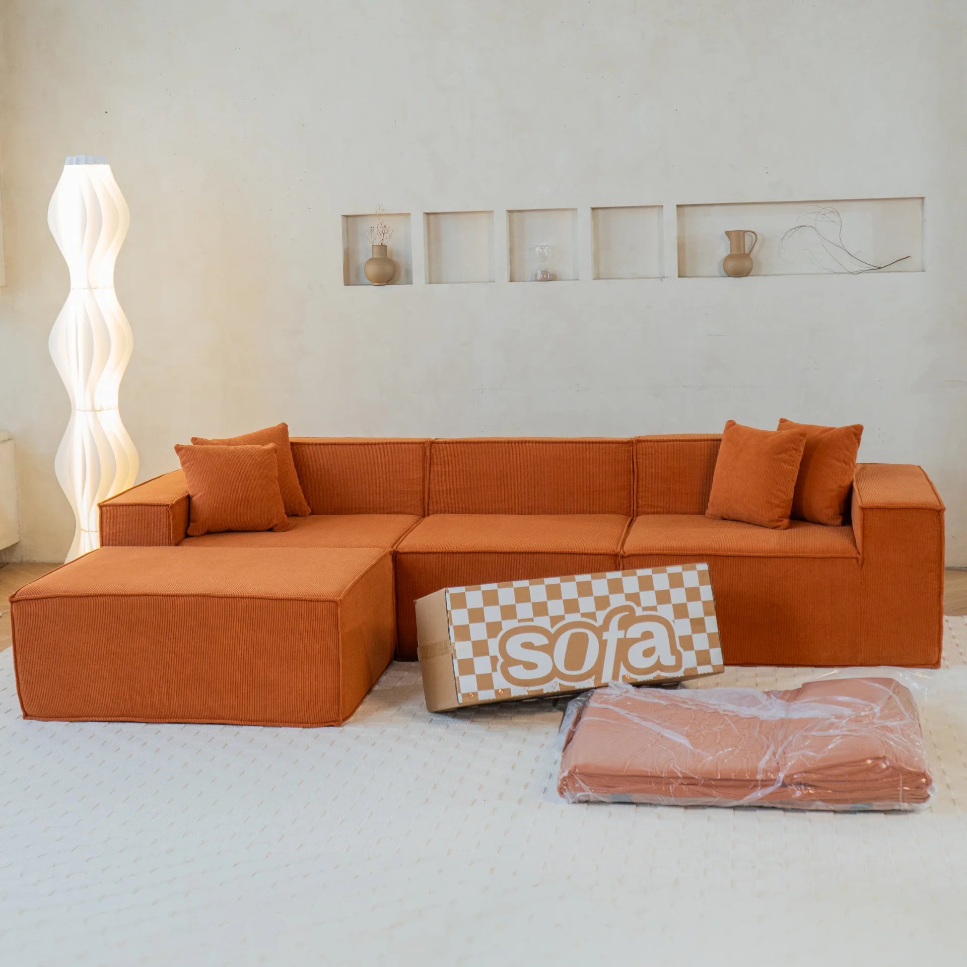 <tc>The growing sofa</tc> Pilion 3 Sitzplätze + 1 Chaiselongue in Boucle – Orange