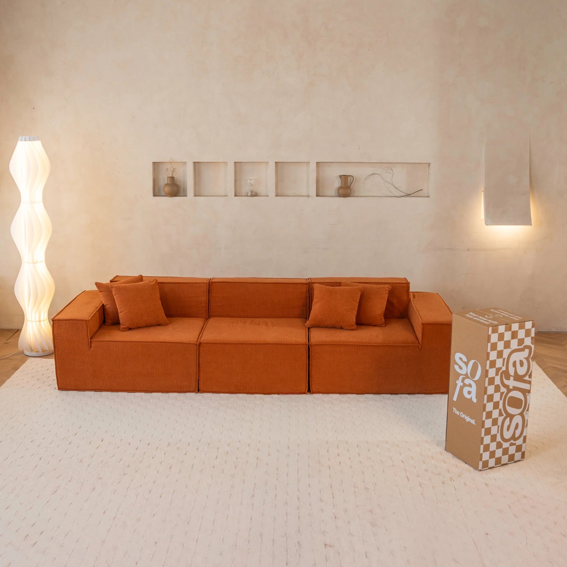 Das mitwachsende Sofa Pelion 3 Sitzplätze in Boucle – Orange